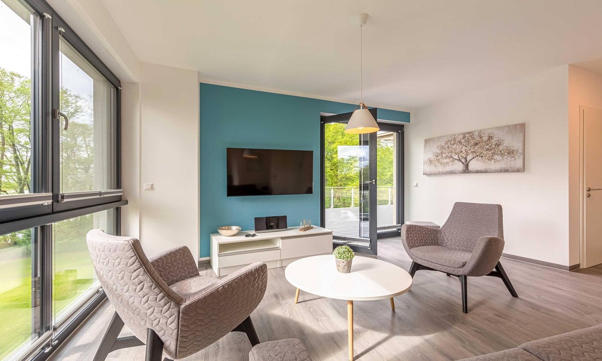 Krakow am See アパートメント | Star vacation apartment "Waldkauz" with roof terrace and view of Lake Krakow