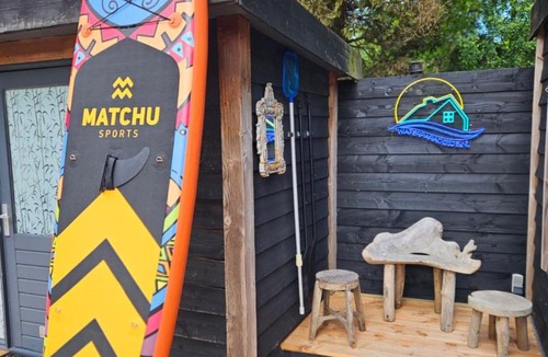 Loosdrecht アパートメント | Bohemian included boat supboards and pool 5 minutes by boat from parking to the bohemien