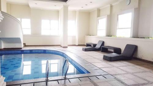 Kampung Bali アパートメント | Good Deal and Comfortable 1BR The Boulevard Apartment By Travelio
