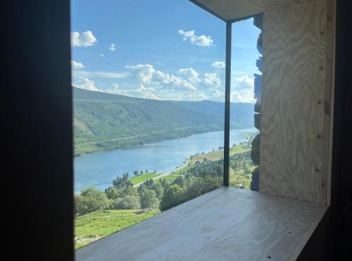 Architect designed sleeping box in barn in Nos