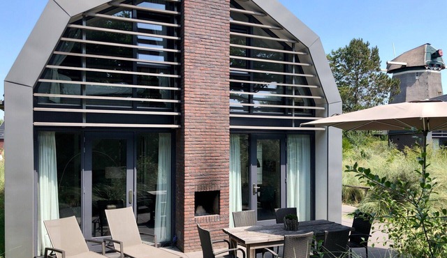 Beautiful new dune villa by the sea with sauna