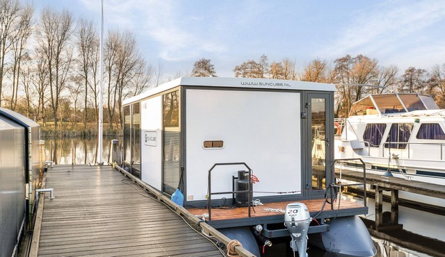 Charming Tiny Houseboat Escape Near Amsterdam by Weltevreden Experience
