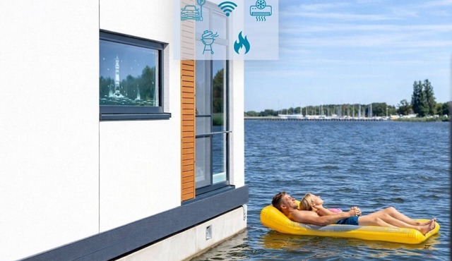 Floatinghouse Ankerplatz: lake view, terrace & wellness on 85 m²