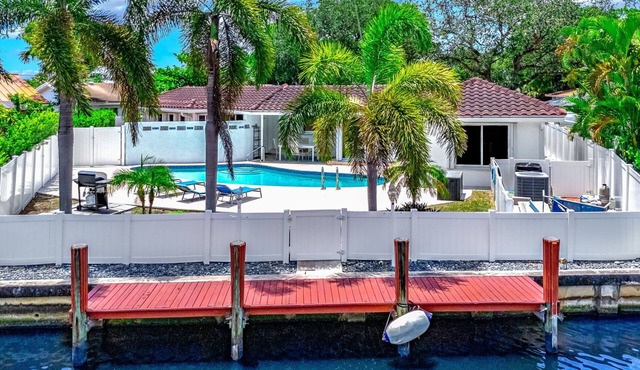 Heated Pool + Waterfront! Close To Beach & Shops!
