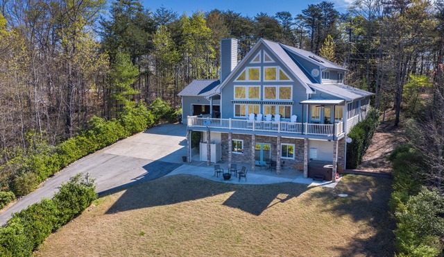 Luxury Home with Amazing Lake & Mountain views, game room, hot tub, lake access!