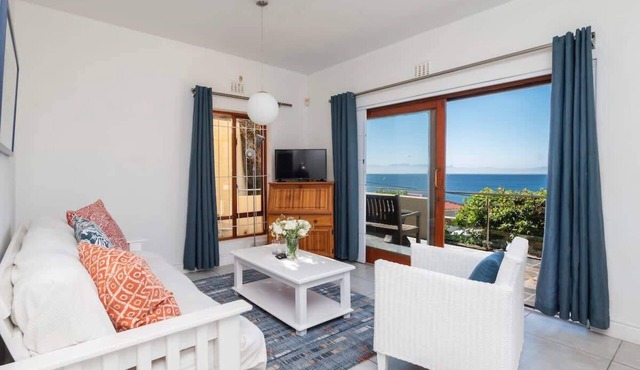 Peaceful Ocean-View Apartment with Balcony