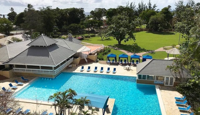 Relaxing Stay w/ PoolView Suite! Convenient Room w/ Living Area, Kitchen, Pool