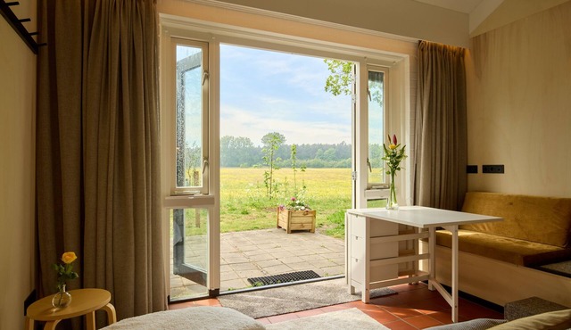 Studio apartment with unobstructed view of meadows and forests near the beach.